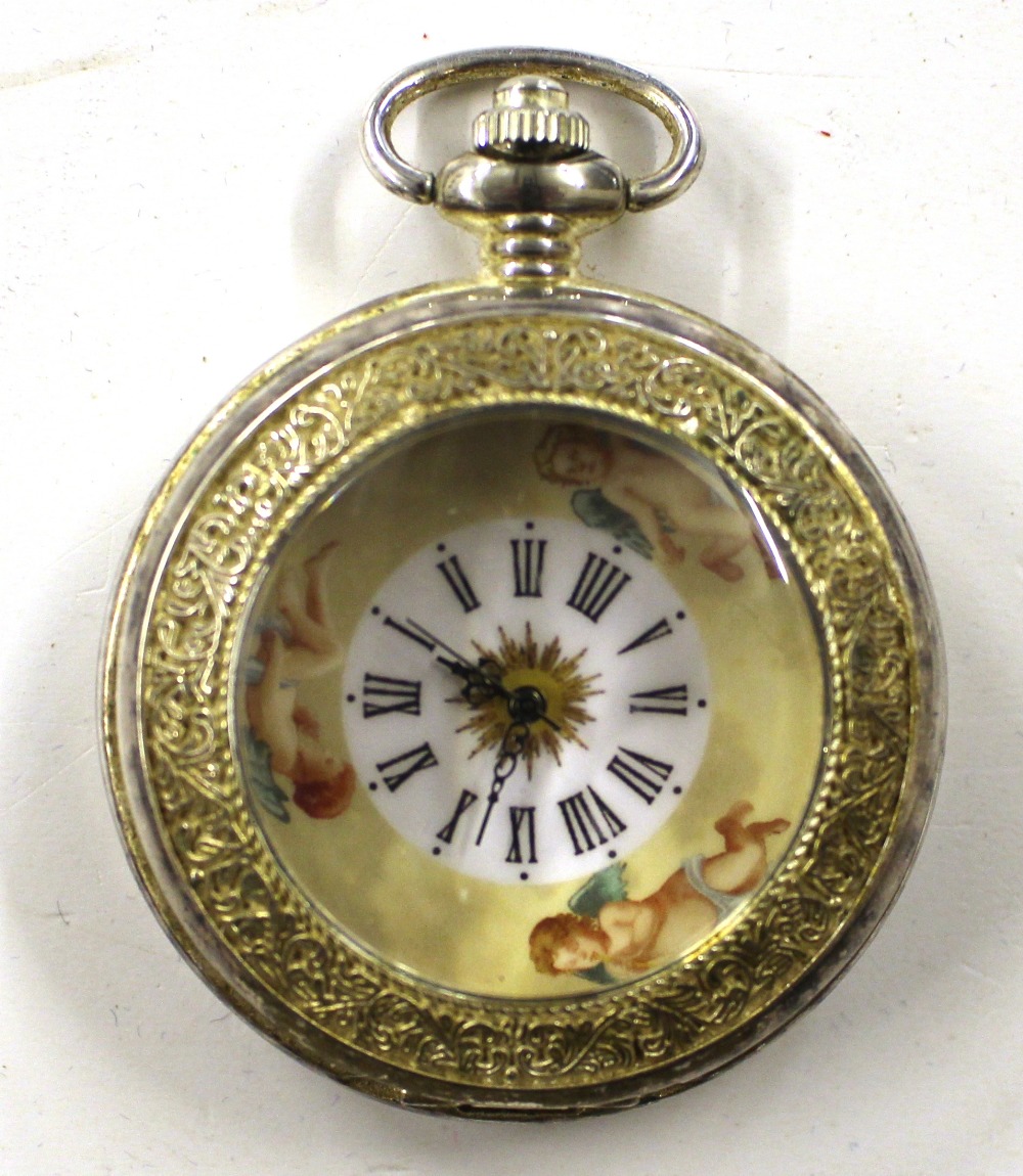 A gilt metal pocket watch with enamelled face