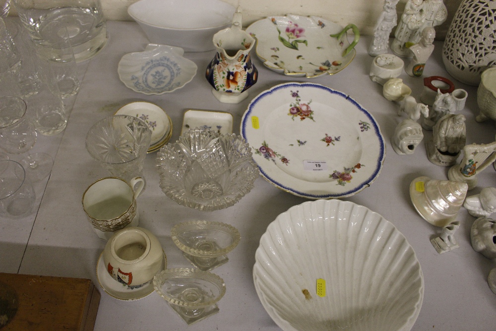 A pair of 19th Century glass salts; a French white