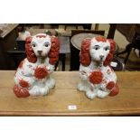 A pair of Staffordshire Spaniel ornaments