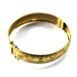 A 9ct gold bangle, approximately 15g