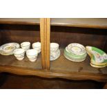 Four Minton hors d'oeuvres dishes decorated with e