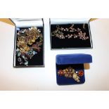 A box of various costume jewellery to include jewe