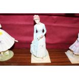 A Royal Worcester figurine 'The Bustle' with certi