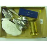 A tray containing a brass money box; cutlery; a si