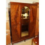 An early 20th Century mahogany double wardrobe