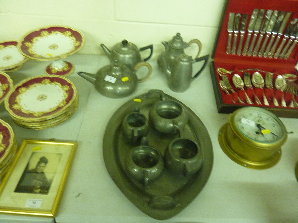Two pewter spot hammered teasets and a two handled