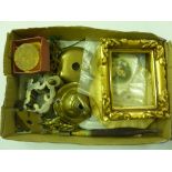 A tray containing brass fittings; cigarette silks;