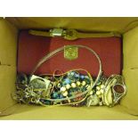 A box of wrist watches and costume jewellery