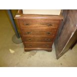A mahogany four drawer chest of small proportions