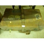 A brown leather suitcase