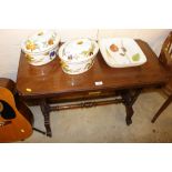 A Victorian mahogany stretcher table