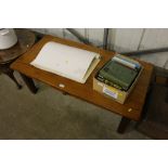 A modern pine coffee table fitted single drawer