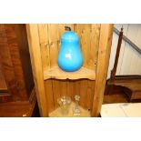 A blue glass pot and cover in the form of a pear t