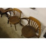 A pair of bentwood slat back elbow chairs