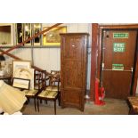 A Victorian grained pine cupboard