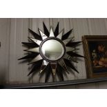 An Art Deco style sunburst wall mirror