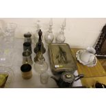Three 19th Century glass decanters and stoppers; t