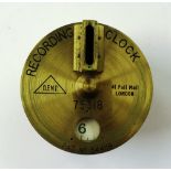 A Dent Of London brass cased recording clock conta