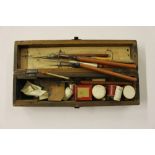 A wooden cased engraving set