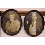 A pair of oval framed black and white photographs