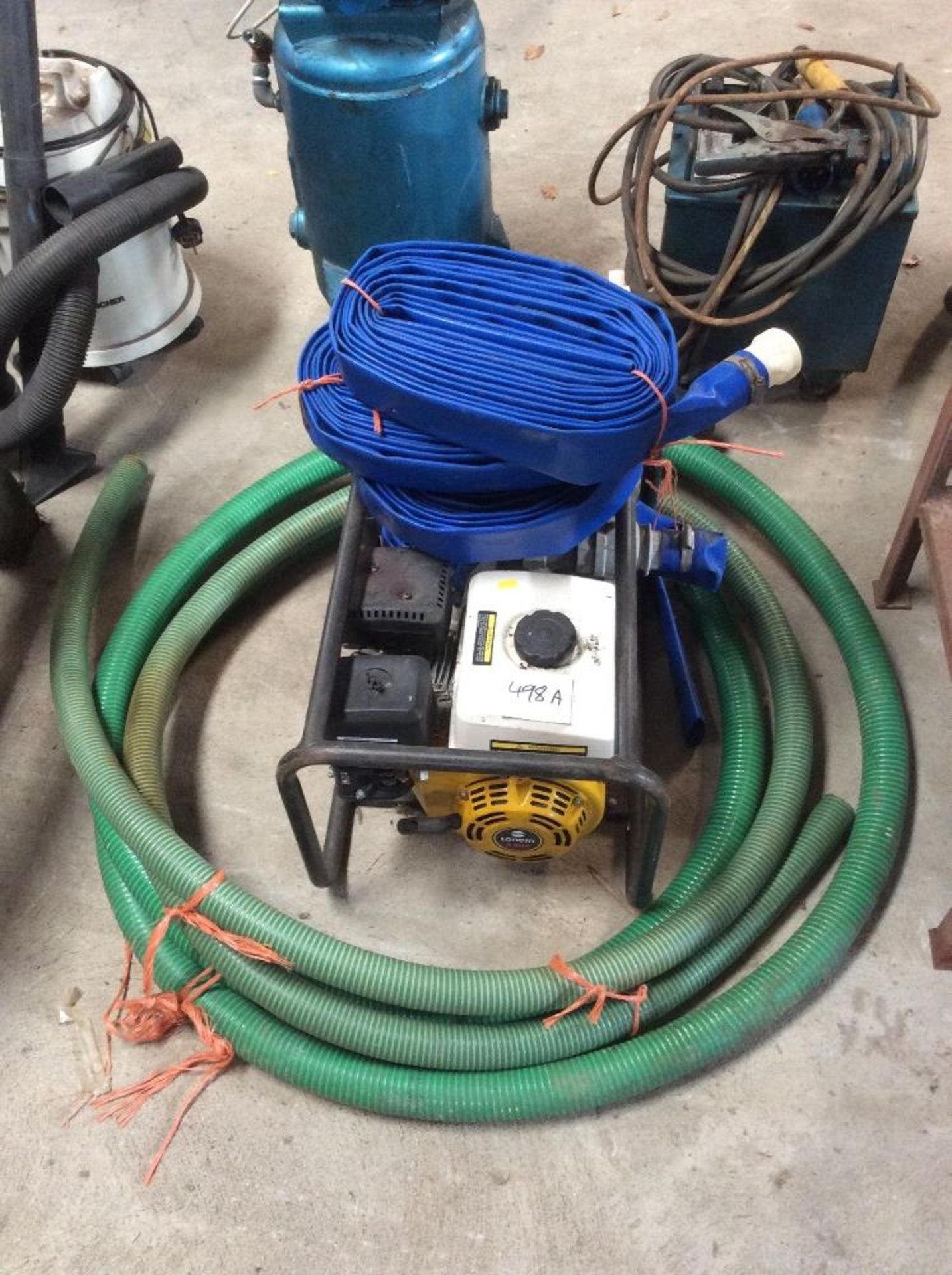 2" petrol driven water pump with approx 8M suction pipe and 35M of lay flat hose