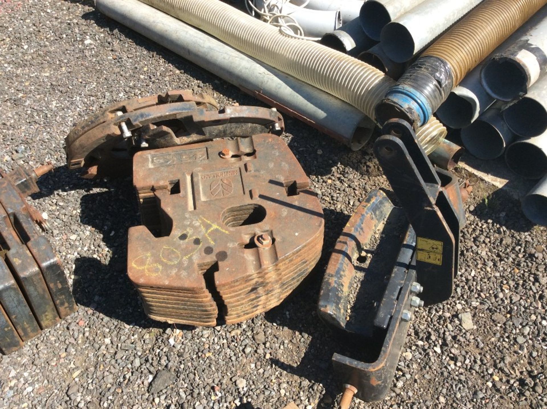 Set of New Holland front weights with carrier