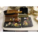 Two black lacquered and floral decorated boxes; a