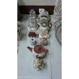 Two Mottoware teapots; pastille burners etc.