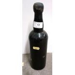 A bottle of Guimaraens vintage Port (unlabelled)