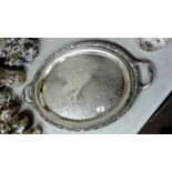 A silver plated foliate engraved two handled tray