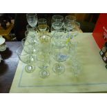 A quantity of various drinking glasses