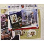 A box of stamp albums; first day covers; coins etc