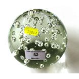 A large modern bubble glass paperweight