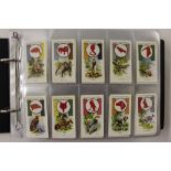 An album of cigarette cards and one other album, l