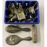 A box containing silver dressing table items; a pa