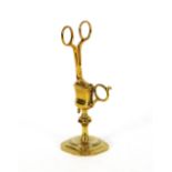 A pair of rare brass candle snuffers on stand