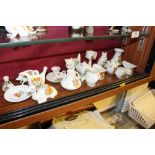 A collection of various local crested china