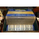 A Pietro piano accordion in fitted case