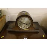 A 20th Century oak cased three hole mantel clock