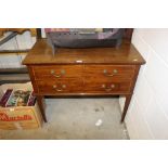 An Edwardian mahogany two drawer chest