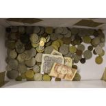 A box of coins and bank notes