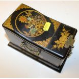 An oriental black lacquered and chinoserie decorat