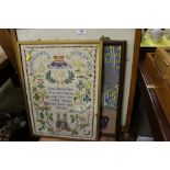 An oak framed fire screen; a wool work embroidery;