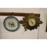 A Smiths sunburst wall clock and one other Smiths