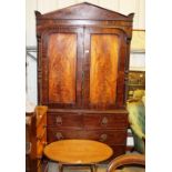 A 19th Century mahogany linen press fitted two