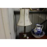 A bras Corinthian column columned table lamp and s