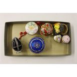 A tray of various small trinket boxes