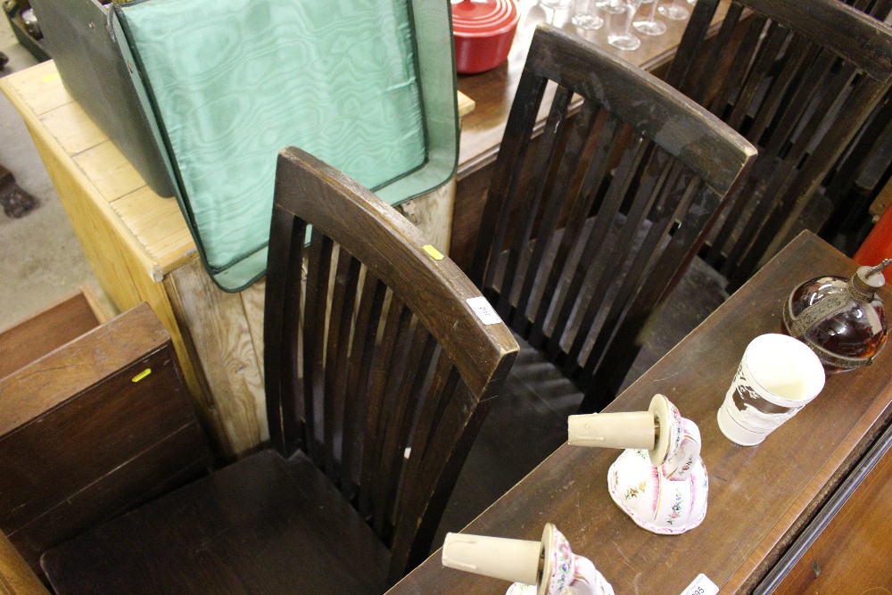 A set of six oak dining chairs