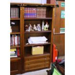 A Dutch style oak bookcase fitted three drawers be