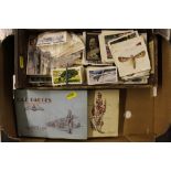 A box of cigarette cards and albums